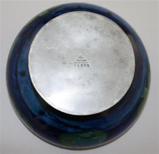 A Moorcroft Moonlit Blue pattern Tudric pewter footed bowl, c.1920, diameter 19.5cm, restorations